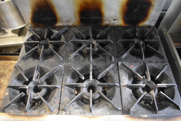 Bakers Pride Commercial Stainless Steel 6 Burner Natural Gas Powered Range With Standard Oven With  Steel Racks and Salamander Broiler On Commercial Casters.  - Image 5 of 8