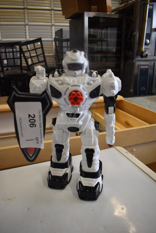 Robot White and Black Action Figure With Shield.