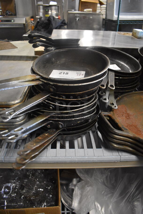 12 Black Frying Pans With Steel Handles. 12 Times Your Bid! 