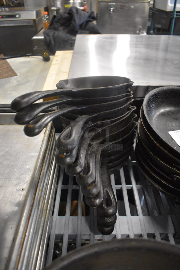 12 Small Cast Iron Pans With Handles. 12 Times Your Bid!  - Image 1 of 3