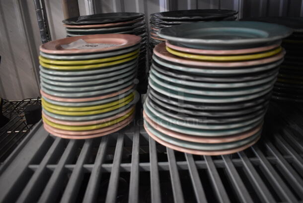34 Homer Laughlin Pastel Multi Colored Plates. 34 Times Your Bid!