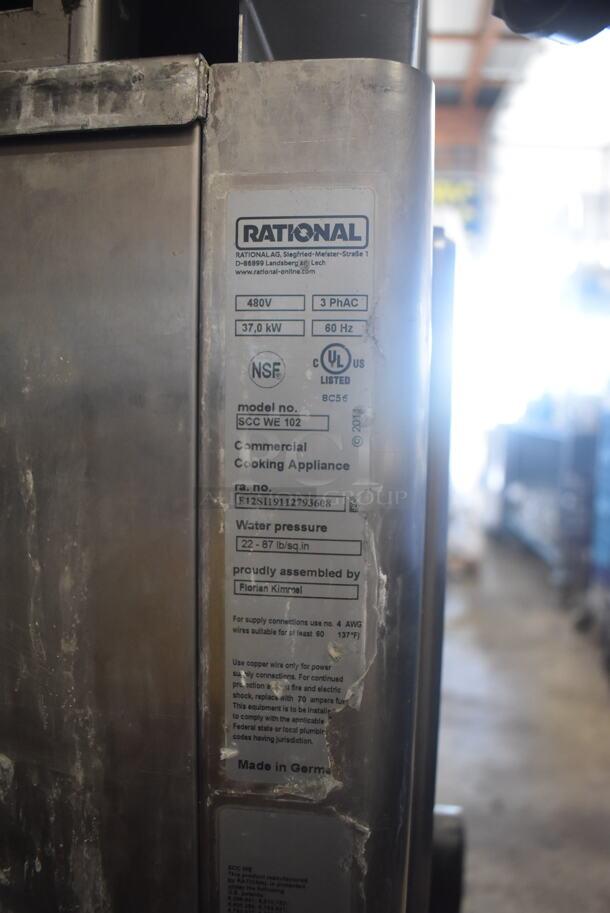 2019 Rational SCC WE 62 / WE 102 Self Cooking Center Commercial Stainless Steel Double Stack Convection Oven With Metal Racks And Additional Pieces on Commercial Casters. Side Door Missing On One Oven. 480 Volts 3 Phase. 2 Times Your Bid! - Image 11 of 12
