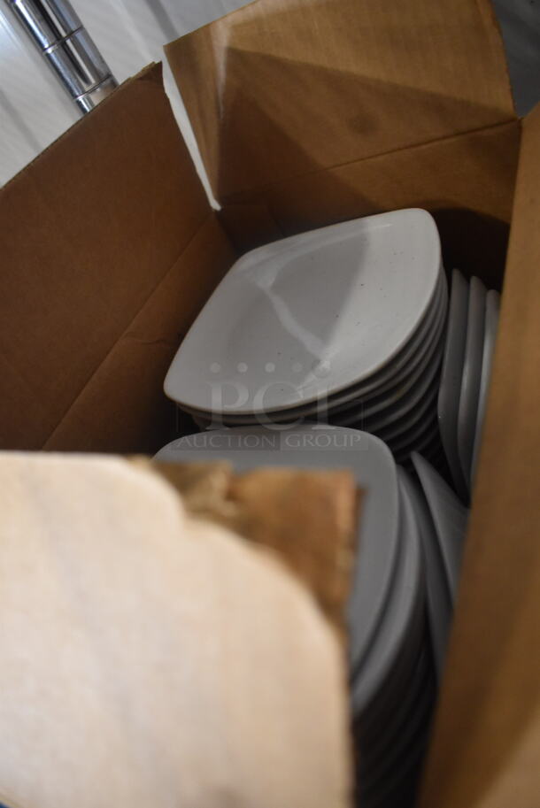 ALL ONE MONEY! Tier Lot of Various Items Including Saucers, Multi Colored Glass Plates, Glass Table Decorations, Box of White Colored Glass Plates, and Wooden Boards - Image 2 of 3