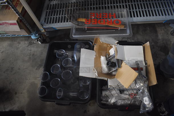 ALL ONE MONEY! Tier Lot of Various Items Including Black Bus Tub with Glass Water Jugs, Trash Can Liners, and Order Here Sign - Image 1 of 4