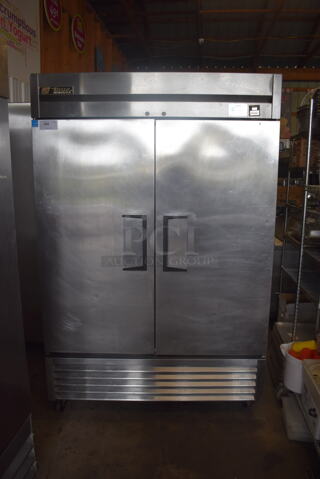 2012 True TS-49 2 Door Commercial Stainless Steel Cooler With Polycoated Racks on Casters. 115 Volts, 1 Phase Tested and Working!