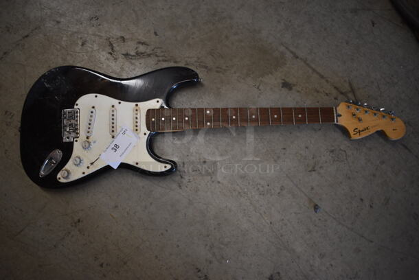 Fender Squier Strat Guitar Previously on Restaurant Wall