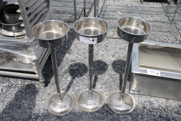 3 Stainless Steel Circular Servers on Poles. 3 Times Your Bid!