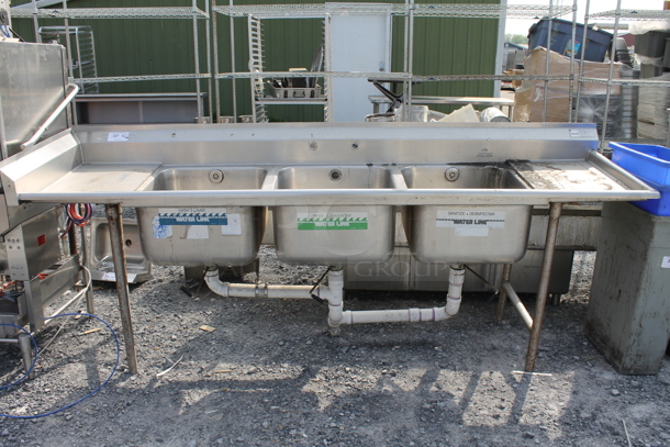 Advance Tabco Stainless Steel 3 Bay Sink w/ Legs and Drainboards. 15.5x23 Drainboards and 19x19 Bays