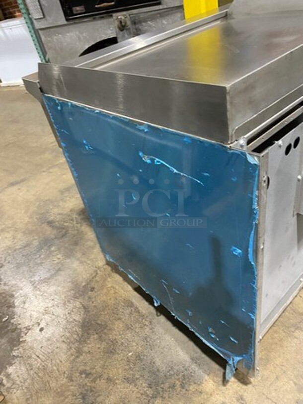WOW! NEW NEVER USED! Garland Commercial Natural Gas Powered 4 Burner Stove With Right Side Flat Griddle! Griddle Has Back And Side Splashes! With 2 Compartment Storage Space Underneath! All Stainless Steel! On Casters! Model: G604G36SS SN: 1712100102342 - Image 4 of 11