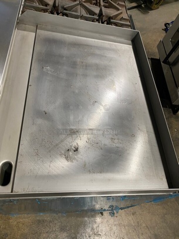 WOW! NEW NEVER USED! Garland Commercial Natural Gas Powered 4 Burner Stove With Right Side Flat Griddle! Griddle Has Back And Side Splashes! With 2 Compartment Storage Space Underneath! All Stainless Steel! On Casters! Model: G604G36SS SN: 1712100102342 - Image 5 of 11