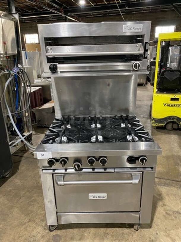 US Range Commercial Natural Gas Powered 6 Burner Stove! With Raised Back Splash And Salamander! With Oven Underneath! All Stainless Steel! On Casters! - Image 1 of 10