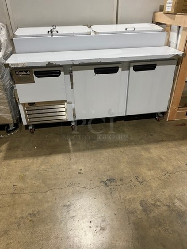 NEW! NEVER USED! LATE MODEL! 2020 Leader Commercial Refrigerated Pizza Prep Table! With 3 Door Storage Space Underneath! All Stainless Steel! On Casters! Model: ESPT72 SN: NF11J2191NW 115V 60HZ 1 Phase