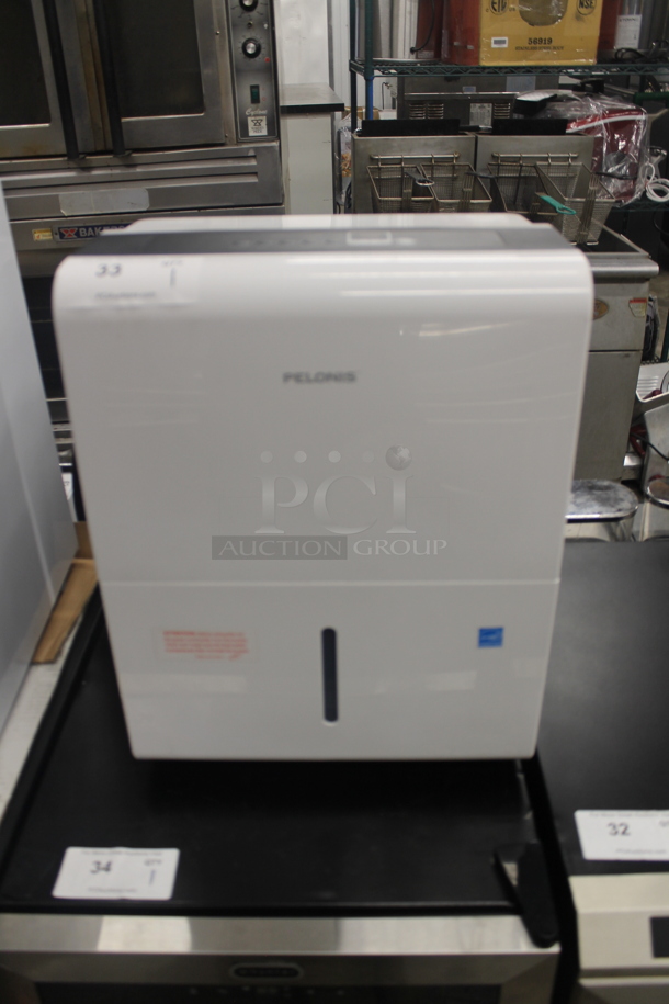 BRAND NEW SCRATCH AND DENT! Pelonis PAD20C1AWT 20.5 Pint White Dehumidifier. 115V, 1 Phase. Tested And Working!  - Image 1 of 6