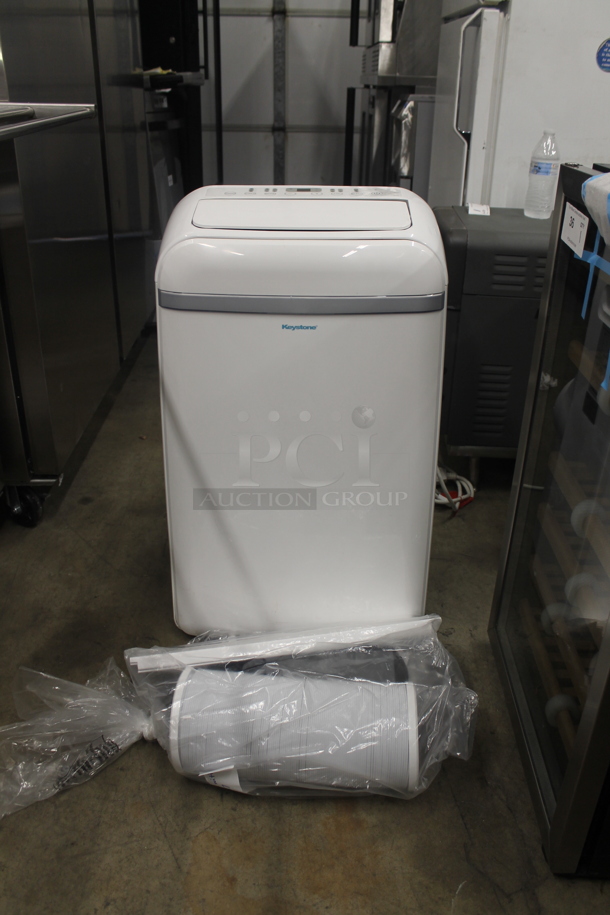 BRAND NEW SCRATCH AND DENT! Keystone KSTAP12B White Mobile Type Air Conditioner. 115V And 12,000 BTU. Tested and Working! - Image 1 of 7