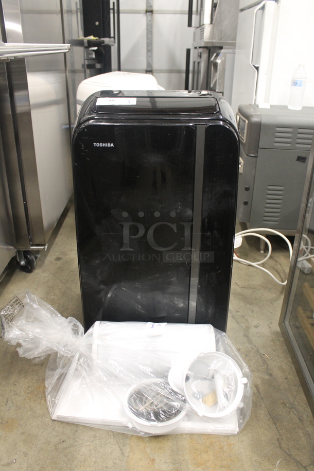 BRAND NEW SCRATCH AND DENT! Toshiba RAC-PD1411CRU Black Mobile Type Air Conditioner. 115V and 14,000 BTU. Tested And Working!  - Image 1 of 7