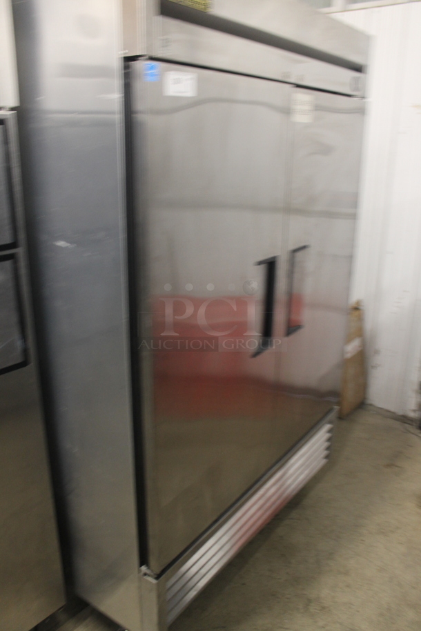 2013 True T-49F Commercial Stainless Steel 2 Door Reach In Freezer With Polycoated Shelves On Commercial Casters. 115V, 1 Phase. Tested and Working! - Image 2 of 6