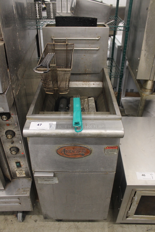 2017 Avantco FF300-N Commercial Stainless Steel Natural Gas Floor Fryer With Fryer Basket/Fryer Press On Commercial Casters. 90,000 BTU.  - Image 1 of 5