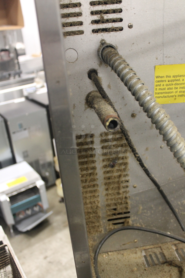 2 Bakers Pride Cyclone Series Commercial Stainless Steel Natural Gas Double Deck Full Size Convection Oven With Steel Racks And Baking Pans On Commercial Casters. 2 Times Your Bid!  - Image 9 of 10