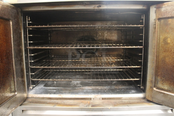 2 Bakers Pride Cyclone Series Commercial Stainless Steel Natural Gas Powered Double Stack Convection Ovens With Steel Racks On Commercial Casters. 2 Times Your Bid!  - Image 4 of 9