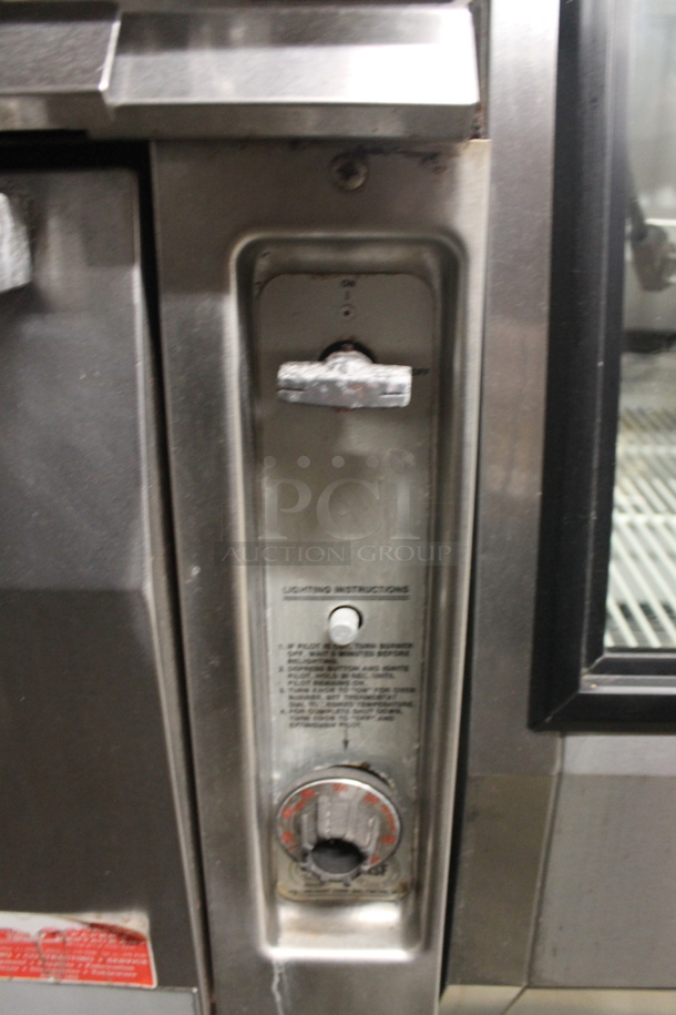 Vulcan Commercial Stainless Steel Natural Gas Powered 10 Burner Gas Range With Overshelf, 2 Ovens And Steel Racks. - Image 8 of 10