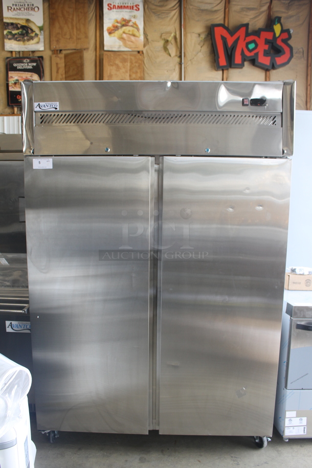 BRAND NEW SCRATCH AND DENT! Avantco 178Z2FHC Commercial Stainless Steel 2 Door Reach In Freezer With Polycoated Shelves On Commercial Casters. 115V. Tested and Powers On But Does Not Get Cold - Image 1 of 10