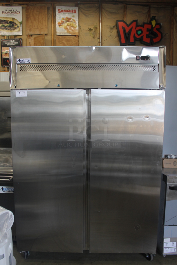 BRAND NEW SCRATCH AND DENT! Avantco 178Z2FHC Commercial Stainless Steel 2 Door Reach In Freezer With Polycoated Shelves On Commercial Casters. 115V. Tested and Powers On But Does Not Get Cold - Image 2 of 10