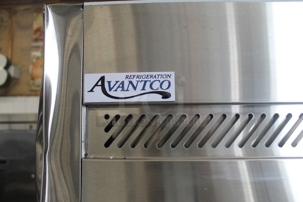 BRAND NEW SCRATCH AND DENT! Avantco 178Z2FHC Commercial Stainless Steel 2 Door Reach In Freezer With Polycoated Shelves On Commercial Casters. 115V. Tested and Powers On But Does Not Get Cold - Image 4 of 10