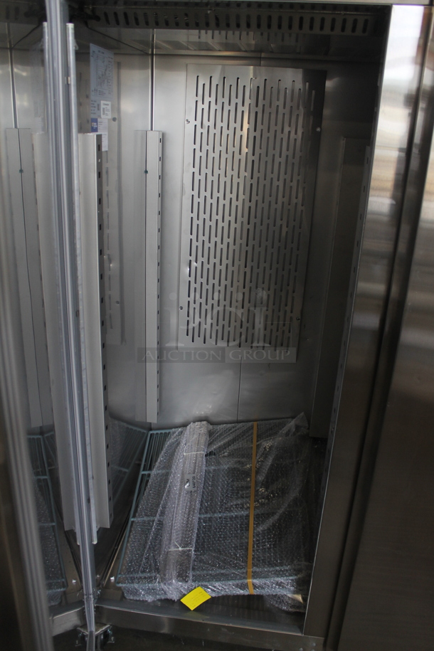 BRAND NEW SCRATCH AND DENT! Avantco 178Z2FHC Commercial Stainless Steel 2 Door Reach In Freezer With Polycoated Shelves On Commercial Casters. 115V. Tested and Powers On But Does Not Get Cold - Image 7 of 10