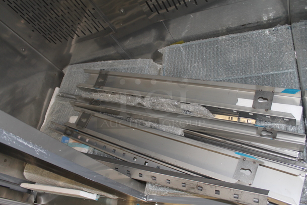 BRAND NEW SCRATCH AND DENT! Avantco 178SS2FHC Commercial Stainless Steel Two Door Reach-In Freezer On Commercial Casters. 115V. Tested and Working! - Image 7 of 11