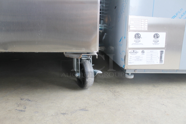 BRAND NEW SCRATCH AND DENT! Avantco 178Z2FHC Commercial Stainless Steel 2 Door Reach In Freezer With Polycoated Shelves On Commercial Casters. 115V. Tested and Powers On But Does Not Get Cold - Image 10 of 10