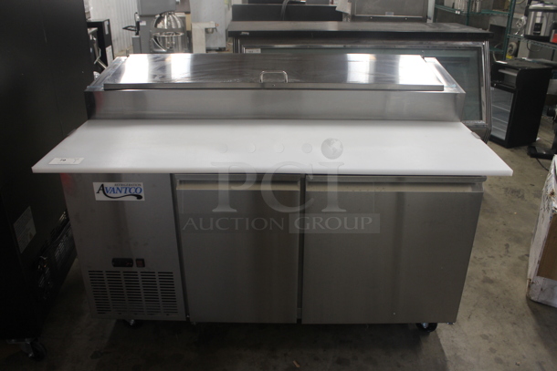 BRAND NEW SCRATCH AND DENT! Avantco 178SSPPT260 Commercial Stainless Steel 2-Door Refrigerated Pizza Prep Table With Polycaoted Shelves On Commercial Casters. 115V. Tested and Does Not Power On - Image 1 of 9