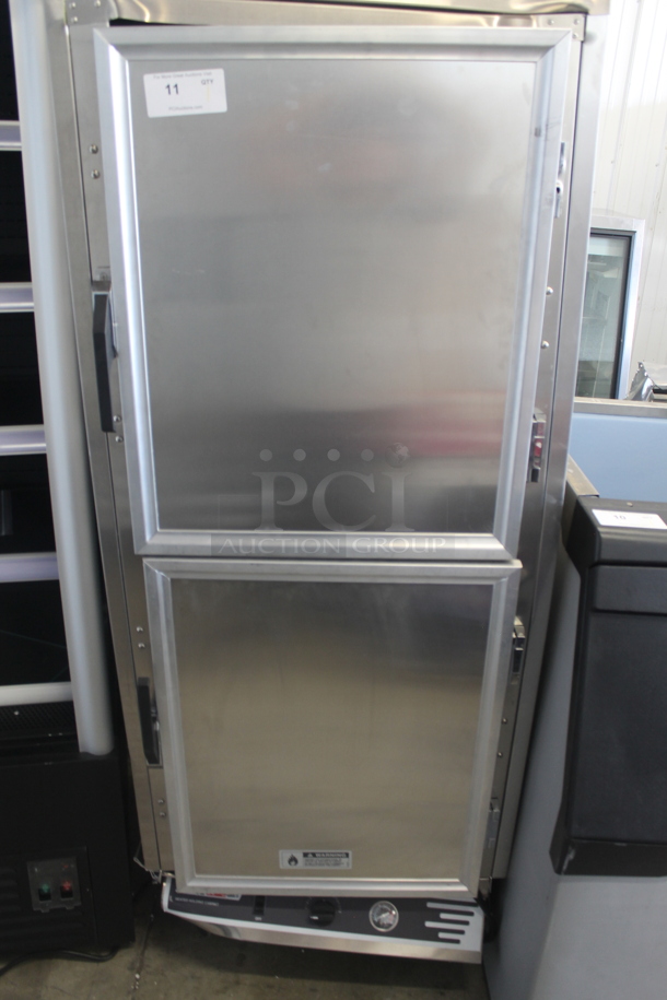 BRAND NEW SCRATCH AND DENT! 2023 ServIt 423CH1UFISD Commercial Stainless Steel Insulated Holding Cabinet With Solid Dutch Doors On Commercial Casters. 120V. Tested and Working!
 - Image 1 of 12