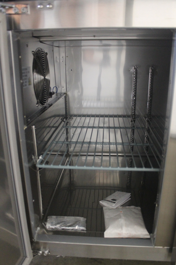 BRAND NEW SCRATCH AND DENT! Avantco 178SSPPT260 Commercial Stainless Steel 2-Door Refrigerated Pizza Prep Table With Polycaoted Shelves On Commercial Casters. 115V. Tested and Does Not Power On - Image 6 of 9