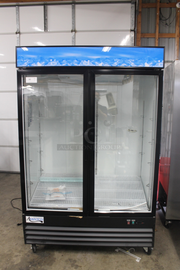 BRAND NEW SCRATCH AND DENT! Avantco 178GDC49HCB Commercial Black Swing Glass Door Merchandiser Cooler With Polycoated Shelves And LED Lighting On Commercial Casters. 115V. Tested and Working! - Image 1 of 8