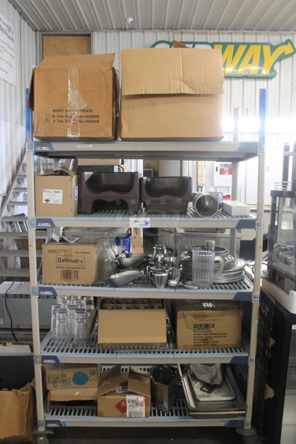 ALL ONE MONEY! Lot of Booster Seats, Ice Scoopers, Glass Carafes, Box of Plastic Handwoven Round Baskets, Drink Pitcher, Round Steel Plates, Creamer Servers With Lids, Hand Sanitizer, Box of Anti-Bacterial, Drinking Glasses, Toilet Tissue Dispenser, Menu Board, Baking Sheets AND MORE! Does Not Include Metro Shelf. - Image 1 of 12