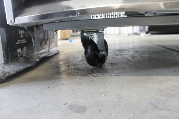 BRAND NEW SCRATCH AND DENT! Avantco 178A49RHC Commercial Stainless Steel Two-Door Reach-In Cooler With Shelving On Commercial Casters. 115V. Tested and Working! - Image 10 of 10