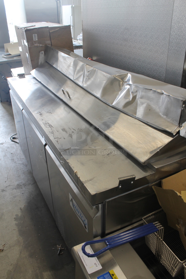BRAND NEW SCRATCH AND DENT! Avantco 178APT71HC Commercial Stainless Steel 3-Door Refrigerated Sandwich/Salad Prep Table With Polycoated Shelves On Commercial Casters. 115V. Tested and Powers On But Does Not Get Cold - Image 2 of 12
