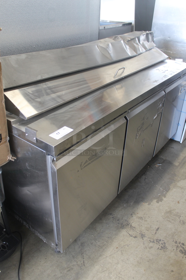 BRAND NEW SCRATCH AND DENT! Avantco 178APT71HC Commercial Stainless Steel 3-Door Refrigerated Sandwich/Salad Prep Table With Polycoated Shelves On Commercial Casters. 115V. Tested and Powers On But Does Not Get Cold - Image 3 of 12