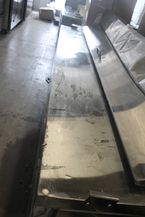 BRAND NEW SCRATCH AND DENT! Avantco 178APT71HC Commercial Stainless Steel 3-Door Refrigerated Sandwich/Salad Prep Table With Polycoated Shelves On Commercial Casters. 115V. Tested and Powers On But Does Not Get Cold - Image 7 of 12