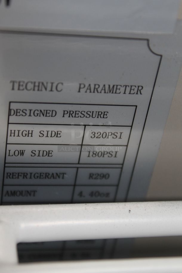 BRAND NEW SCRATCH AND DENT! Avantco 178APT71HC Commercial Stainless Steel 3-Door Refrigerated Sandwich/Salad Prep Table With Polycoated Shelves On Commercial Casters. 115V. Tested and Powers On But Does Not Get Cold - Image 12 of 12