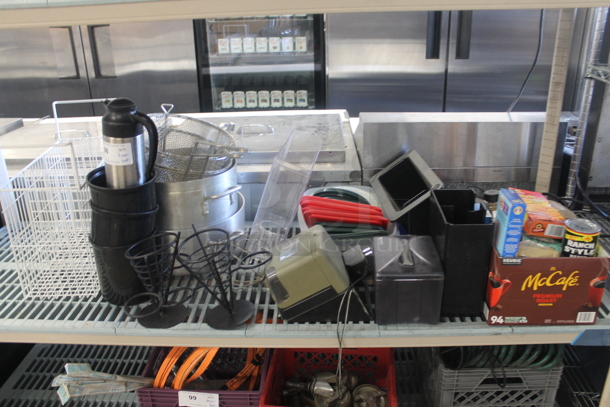 ALL ONE MONEY! Lot of Coffee Carafe, Aluminum Pots, Red And Green Plastic Lids, Plastic Napkin Dispenser, Boxed/Canned Goods, Black Buckets, White Baskets, Dual Temperature Heat Gun AND MORE. Does Not Include Metro Shelving. - Image 1 of 5