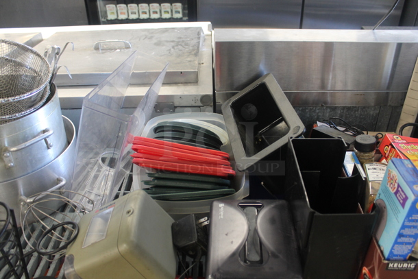 ALL ONE MONEY! Lot of Coffee Carafe, Aluminum Pots, Red And Green Plastic Lids, Plastic Napkin Dispenser, Boxed/Canned Goods, Black Buckets, White Baskets, Dual Temperature Heat Gun AND MORE. Does Not Include Metro Shelving. - Image 3 of 5