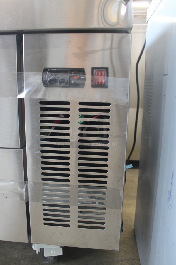BRAND NEW SCRATCH AND DENT! Avantco 178CBE84HC Commercial Stainless Steel 4 Drawer Refrigerated Chef Base On Commercial Casters. 115V. Tested and Powers On But Does Not Get Cold - Image 4 of 8