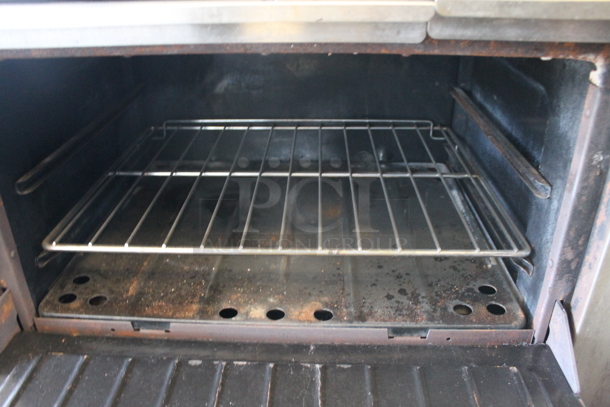 Garland Commercial Stainless Steel Natural Gas Powered Stove With 6 Burners, Backsplash And Oven With Steel Rack. - Image 5 of 8