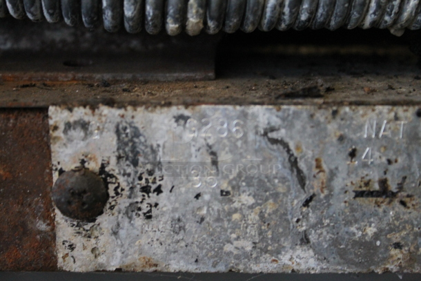 Garland Commercial Stainless Steel Natural Gas Powered Stove With 6 Burners, Backsplash And Oven With Steel Rack. - Image 7 of 8