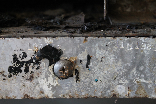 Garland Commercial Stainless Steel Natural Gas Powered Stove With 6 Burners, Backsplash And Oven With Steel Rack. - Image 8 of 8