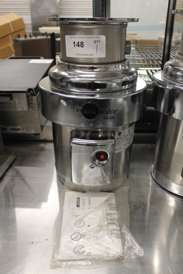 BRAND NEW SCRATCH AND DENT! Insinkerator SS200-27 Commercial Stainless Steel Garbage Disposer. 115/208/230V, 1 Phase.  - Image 1 of 5