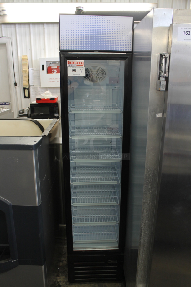 BRAND NEW SCRATCH AND DENT! Galaxy 177GDN5RBB Commercial Black Single Door Merchandiser Cooler With Polycoated Shelves. 110-120V. Tested and Powers On But Does Not Get Cold - Image 1 of 5