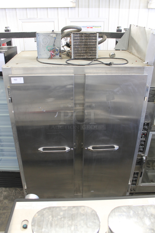 Continental 2R Commercial Stainless Steel 2 Door Reach-In Cooler With Polycoated Shelves. 115V, 1 Phase. Tested and Working! - Image 1 of 7
