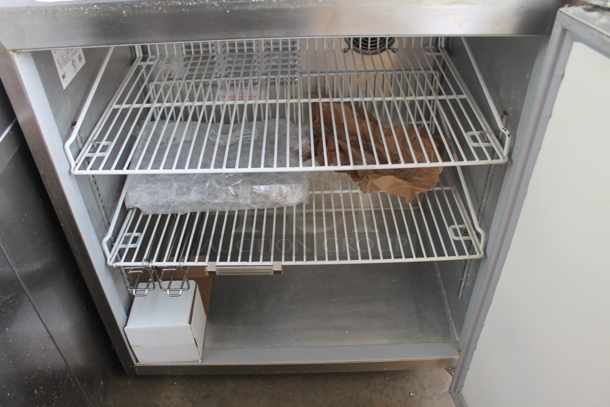 Silver King SKUCF7F Commercial Stainless Steel Undercounter Single Door Freezer With Polycoated Shelves. 115V. Tested and Powers On But Does Not Get Cold - Image 4 of 5